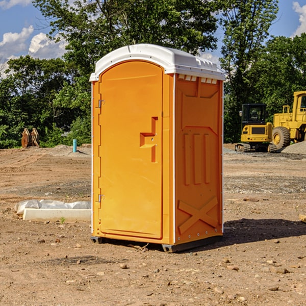 what is the cost difference between standard and deluxe portable restroom rentals in Albany MO